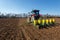 Agriculture tractor sowing seeds.