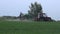 Agriculture tractor spraying crop wheat field