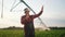 Agriculture virtual reality. A farmer in virtual reality glasses controls a machine to irrigate corn field. Agriculture