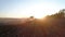 Agriculture works by rural machinery or tractor at sunset field, nature farm