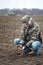 Agronomist checks the soil moisture before sowing cereals