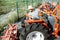 Agronomist choosing tractor at the agricultural shop