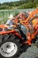 Agronomist choosing tractor at the agricultural shop