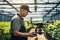 agronomist drone inspects plant in greenhouse
