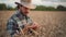 Agronomist examining cultivated cereal crop before harvesting