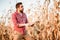 Agronomist portrait of man using tablet in agriculture harvest