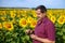 Agronomist in sunflower field