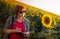 Agronomist in sunflower field