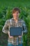 Agronomist with tablet computer in corn field