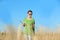 Agronomist with tablet in wheat field.  grain crop