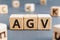 AGV - acronym from wooden blocks with letters