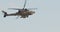 AH-64D Apache Longbow military helicopter attacking targets with canon