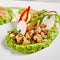 Ahi Tuna Seviche with Radish Slices and Rucola on White Plate