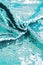 AI aqua blue trendy color of year 2021 sequin fabric texture. Shiny sparkling background. Clothing piece of glitter