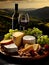 AI-Enhanced Serene Pastoral Wine and Cheese Board.