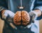 AI generated a close-up of gloved doctor\\\'s hands holding a human brain.