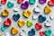 ai generated concept image of colorful hearts on white background, generative ai love wallpaper