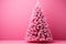 AI generated. Fluffy pink Christmas on pink wall background with toy balls with copy space