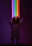 AI generated illustration of an astronaut with arms outstretched, with a rainbow on dark background