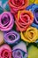 AI generated illustration of a bouquet of colourful roses with a blurry background