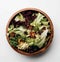 AI generated illustration of a bowl of freshly prepared salad, full of a variety of vegetables