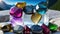 AI generated illustration of a close-up of a variety of gems and crystals against a bright blue sky