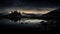 AI generated illustration of a lake surrounded by a majestic towering mountain range at night