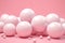 AI-generated illustration of multiple white balls on a vibrant pink background