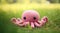 AI generated illustration of a pink plush octopus toy lying on a grassy field