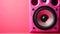 AI generated illustration of a pink speaker on a pink background