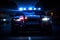 AI generated illustration of a police car in a dark city street illuminated by its headlights