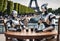 AI generated illustration of two robots drinking coffee in front of the Eiffel Tower in Paris