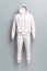 AI generated illustration of a white tracksuit on a gray background