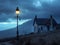 AI-Generated Image of Old Evening House with Street Lamp, Surreal Magritte-Inspired Fantasy Photo