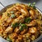 AI generated image of a plate of spicy chicken biriyani garnished with green coriander