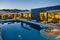 Ai generated a luxurious resort swimming pool with comfortable lounge chairs