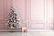 AI generated. Pink Christmas Tree with present gift boxes decorated with toy balls on pink wall