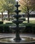 AI generated realistic image of a water fountain in a public park