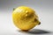 Ai Generative Lemon with water droplets on a white background. Studio shot.