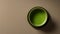 AI-generative: Minimalist Overhead View of Matcha Tea with Captivating Negative Space