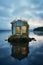 AI Generative Photo of Cabin House Located next to the pier. The scenery is mesmerizing. Serene summer scene with clear blue sky.