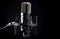 Ai generative. Professional studio microphone on black