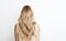 Ai generative. Rear view of a girl with beautiful long blonde hair