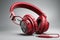 Ai Generative Red headphones on a gray background with copy space, music concept