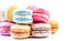 AI generative. Sweet and colourful french macaroons on white