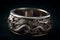 Ai Generative Wedding silver ring with dragon design on a black background. Jewelry and luxury concept