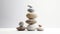 AI illustration of smooth stones carefully stacked atop one another.