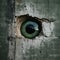 AI illustration of a spooky green eye peeking through a crack in an aged concrete building