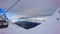 Aibga mountain peak covered by snow and ski lift. Gorki Gorod ski resort. Sochi, Russia