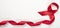 AIDS disease. Red ribbon on white background. Top view with copy space or place for text. Horizontal banner for world